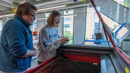 Laser cutter maker space at the Student Innovation Center.